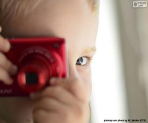 Puzle Dítě s fotografickou kamerou