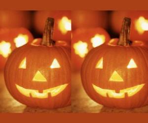 Puzle Halloween dýně vyřezávané s tváří a se zapálenou svíčkou uvnitř nebo bludička