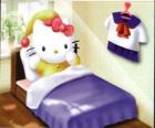 Hello Kitty v posteli