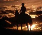 Cowboy jízdu za soumraku
