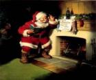 Santa čtení poznámku od krbu