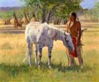 Indický bojovník s koněm v blízkosti tábora