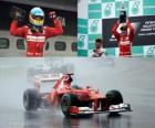 Fernando Alonso slaví své vítězství v Grand Prix Malajsie (2012)