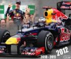 Sebastian Vettel, mistr světa Formule 1 2012 se Red Bull Racing, je nejmladší šampion tří time