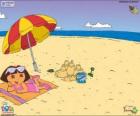 Dora na pláži