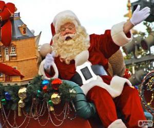 Puzle Santa Claus mával z magické saně naložené s vánoční dárky