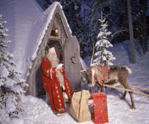 Puzle Santa u dveří jeho domu se soby a dárky