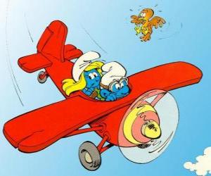 Puzle Šmoula a Šmoulinku létání červené letadlo